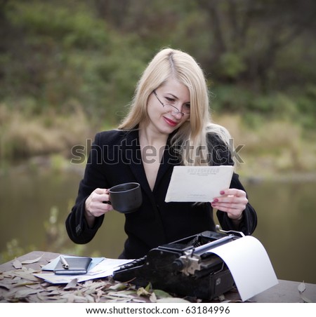 Office on the nature. The young sexual secretary does work. Old style.