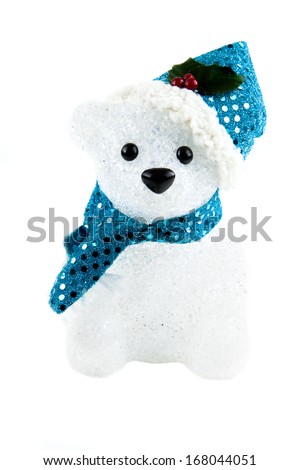 A holiday teddy bear against a white background