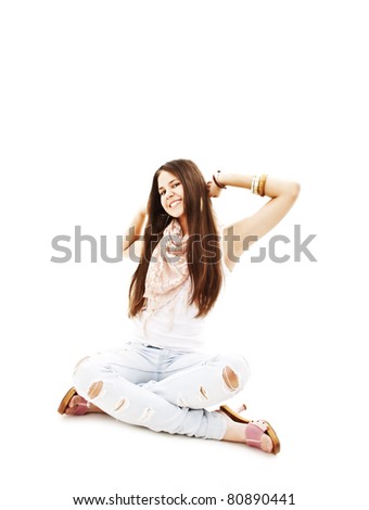 Portrait of happy excited girl with arms extended. Over white background