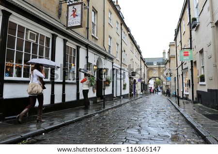 BATH - OCT 5: View of an old cobble street in the city centre on Oct 5, 2012 in Bath, UK. Bath is one of the UK\'s top tourist destinations with 4.65 million visitors in 2011.