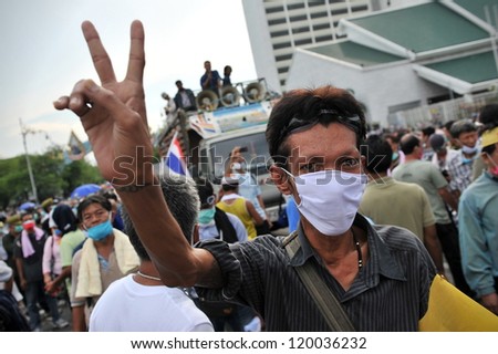 BANGKOK - NOV 24: A nationalist anti-government protester from Pitak Siam rallies at Makhawan Bridge on Nov 24, 2012 in Bangkok, Thailand. Pitak Siam are calling for the government to be overthrown.