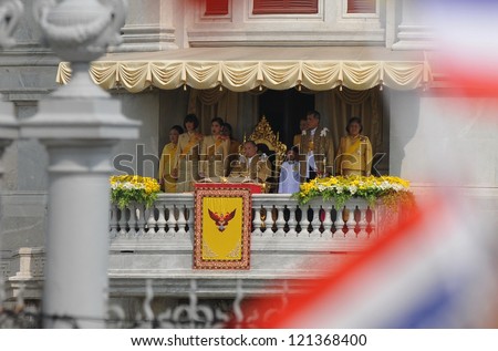 BANGKOK - DEC 5: Thailand\'s King Bhumibol Adulyadej surrounded the Thai royal family makes a rare public appearance on the balcony of the royal palace on his 85th birthday on Dec 5, 2012 in Bangkok.
