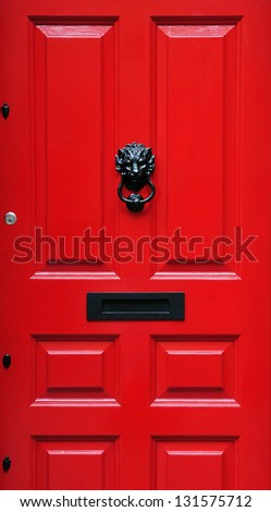 Close-Up Detail of a Red Front Door of a London Town House