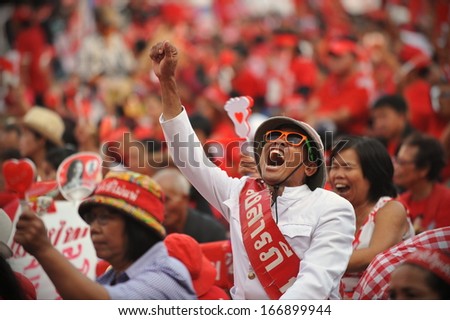 BANGKOK - NOV 30: Red Shirt supporters rally in support of the government on Nov 30, 2013 in Bangkok, Thailand. Thousands showed support, while daily anti-government rallies take place in the capital.