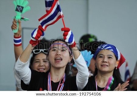 BANGKOK - NOV 27: Anti-government protesters take part in a rally outside a government complex on Nov 27, 2013 in Bangkok, Thailand. The anti-government protest movement calls for political reform.