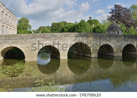 View of the Historic Old Stone Packhorse Bridge over the River Avon in Bradford on Avon in Wiltshire England