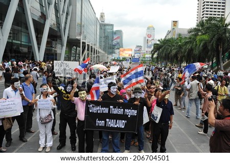 BANGKOK - JUNE 2: Anti government protesters gather for a large rally in Bangkok\'s shopping district on June 2, 2013 in Bangkok, Thailand. The protesters call for the government to be overthrown.
