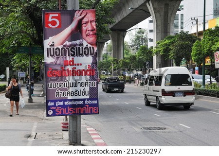 BANGKOK - MAY 25: A roadside election campaign placard endorses Chuwit Kamolvisit\'s Rak Thailand party May 25, 2011 in Bangkok, Thailand. Thais go to the polls on 3rd July.