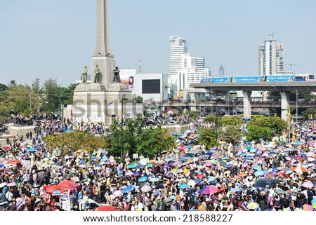 BANGKOK - DEC 22: Anti government protesters rally at Victory Monument on Dec 22, 2013 in Bangkok, Thailand. Protesters call for the government to be overthrown.