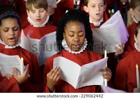 BRISTOL - NOV 7: Bristol Cathedral Choir peform in Cabot Circus shopping mall on Nov 7, 2014 in Bristol, UK. The choir peformed traditional Christmas carols for visitors to the mall.