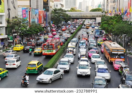 BANGKOK - MAR 7: Traffic reaches grid lock on a busy city centre road on Mar 7, 2012 in Bangkok, Thailand. Annually an estimated 150,000 new cars add the Thai capital\'s infamous traffic jams.