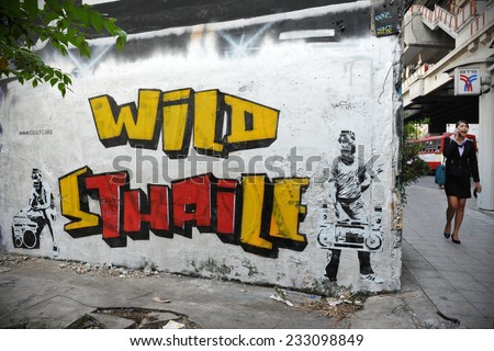 BANGKOK - MAR 5: Graffiti piece by London based artist Codefc on a wall in central Bangkok on Mar 5, 2012 in Bangkok, Thailand. Codefc\'s art can be seen on walls in many asian and european cities.
