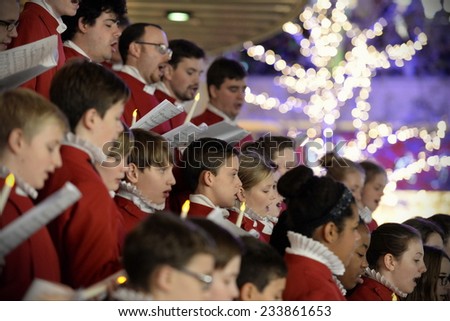 BRISTOL - NOV 7: Bristol Cathedral Choir peform in Cabot Circus shopping mall on Nov 7, 2014 in Bristol, UK. The choir peformed traditional Christmas carols for visitors to the mall.