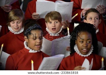 BRISTOL - NOV 7: Bristol Cathedral Choir perform in Cabot Circus shopping mall on Nov 7, 2014 in Bristol, UK. The choir peformed traditional Christmas carols for visitors to the mall.