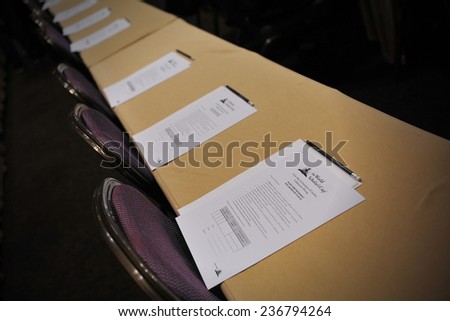BANGKOK - JUN 22: Exam papers sit on tables before an academic competition held between schools in the southeast Asia region on Jun 22, 2012 in Bangkok, Thailand.
