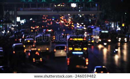 Defocused Lights of Traffic on a Busy City Road at Night - Image Has Soft Focus