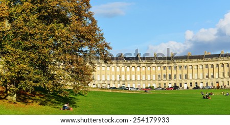 BATH - OCT 18: People gather in Victoria Park below the landmark Royal Crescent on Oct 18, 2014 in Bath, UK. Bath is a UNESCO World Heritage status city with over 4 million visitors per year.
