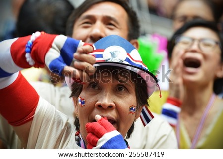 BANGKOK - JAN 5: Anti government protesters take part in a large rally on Jan 5, 2014 in Bangkok, Thailand. The protesters call for political reform and for the government to be overthrown.