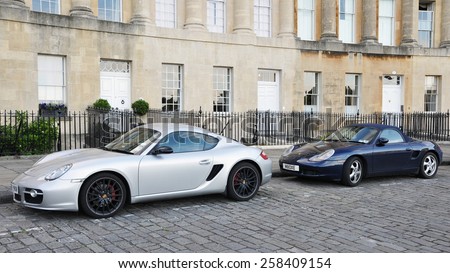 BATH - JUL 26: View of Porsche sports cars parked on the landmark Royal Crescent on Jul 26, 2010 in Bath, UK. Bath is a UNESCO World Heritage city with over 4 million visitors per year.