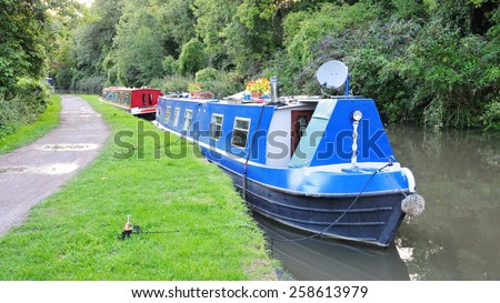 Scenic View of a Narrow Boat on the kennet and Avon Canal near Bath in Somerset England