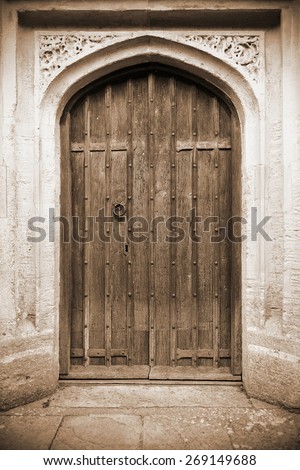 View of a Beautiful Old Oak Door Background in Sepia