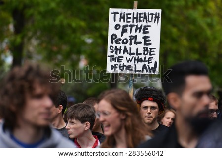 LONDON - MAY 30: Protesters rally against public sector spending cuts following the re-election of the Conservative party on May 30, 2015 in London, UK. The government plans severe austerity measures.