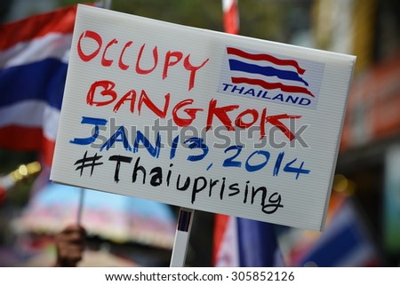 BANGKOK - JAN 5: Anti-government protesters take part in a large rally on Jan 5, 2014 in Bangkok, Thailand. The anti-government protest movement is calling for political reform.