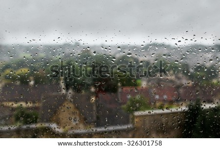 View of Water Drops on a Window during a Rainy Day