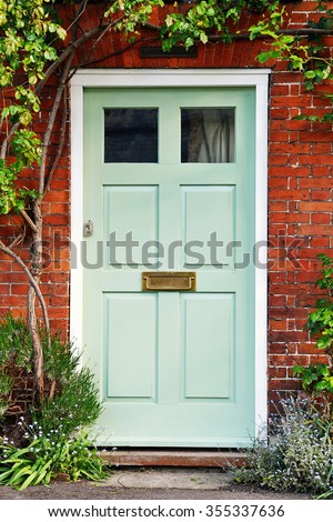 View of a Beautiful Front Door of a Red Brick House