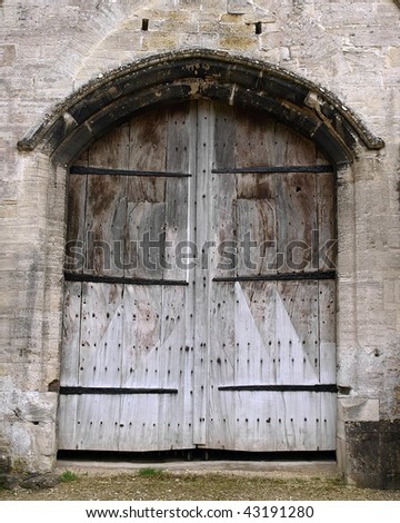 Old Arched Doorway with Oak Doors