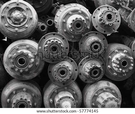 Pile of Rust Old Axles in a Scrap Yard in Black and White
