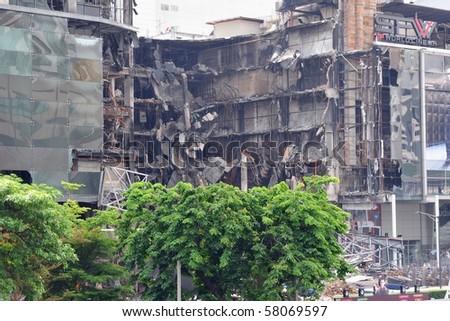 BANGKOK - MAY 23: Fire damaged collapsed exterior of Central World shopping mall in the aftermath of the anti government 'Red Shirt' protest May 23, 2010 in Bangkok, Thailand.