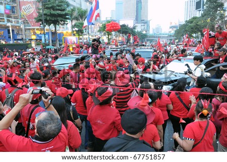 BANGKOK - DECEMBER 19: An estimated 10,000 anti government Red Shirts defy an emergency decree to protest at Rachaprasong junction on December 19, 2010 in Bangkok, Thailand.