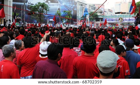 BANGKOK - JANUARY 9: 30,000 anti government Red Shirts protest at Rachaprasong junction on January 9, 2011 in Bangkok, Thailand. The Red Shirts are calling for political change and fresh elections.