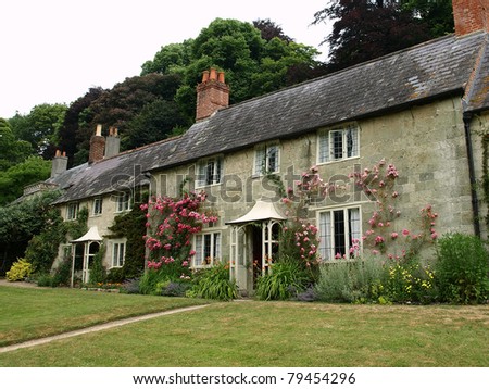 Row of Traditional English Cottages and Gardens in the Cotswolds - Built Early 19th Century