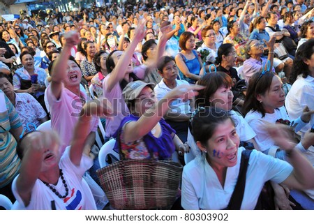 BANGKOK - JUNE 23: Supporters of the Thai Democrat Party attend an election campaign rally at Ratchaprasong in the city centre June 23, 2011 in Bangkok, Thailand. Thais go to the polls on July 3.