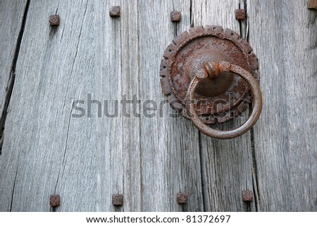 Detail of an Old Oak Door and Rusted Handle with Plenty of Copy Space