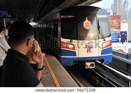 BANGKOK - FEB 22: A BTS (Bangkok Transit System) Skytrain pulls into Siam Square station in the city centre as the rail network recently opens six new stations on Feb 22, 2012 in Bangkok, Thailand.