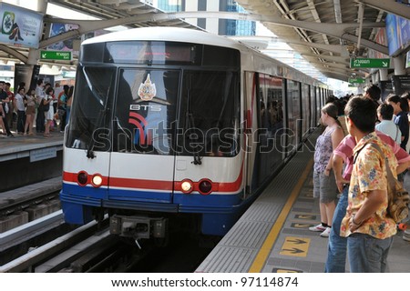 BANGKOK - MARCH 5: A BTS (Bangkok Transit System) Skytrain pulls into Asoke station in the city centre as the rail network recently opens six new stations on March 5, 2012 in Bangkok, Thailand.