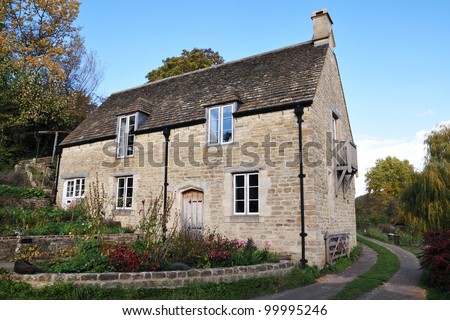 Old Stone House on a Country Road in Rural England