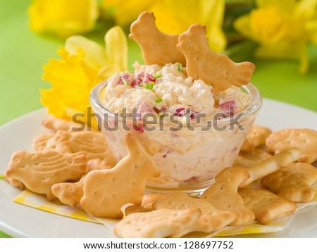 Easter egg and cheese appetizer with animal crackers, selective focus