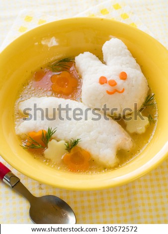 Chicken soup with rice rabbit, selective focus.  Shot for a story on homemade, organic, healthy baby foods.