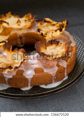 Biscuit cake with dried pineapple, selective focus