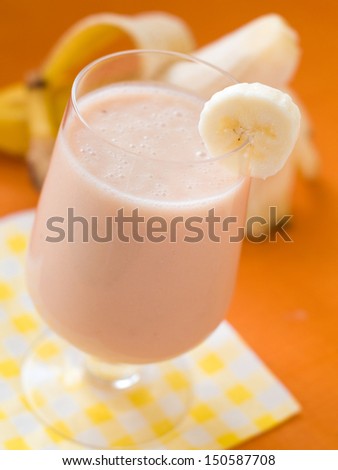 Milk shake with banana, selective focus