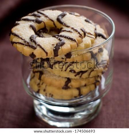 Biscuit cookies with chocolate and sugar, selective focus