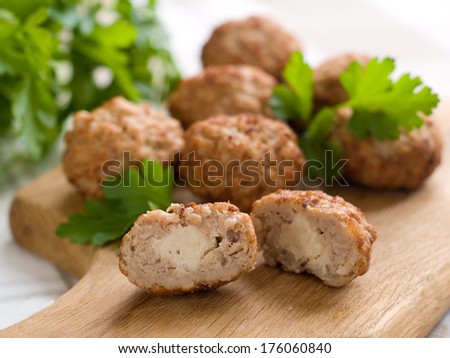 Minced meat ball in bowl, selective focus
