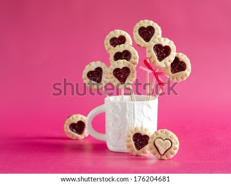Cookie pop decorated with heart, selective focus
