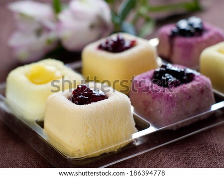 Assorted lemon and fruit mini cakes, selective focus