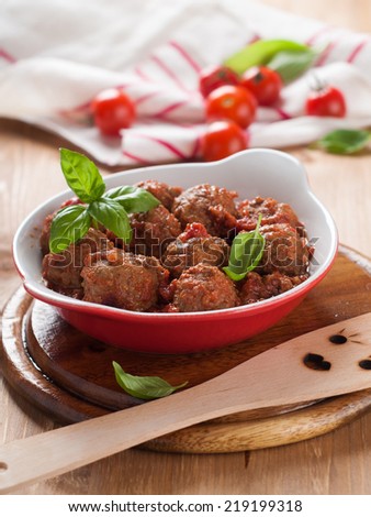 Minced meat ball in tomato saucel, selective focus