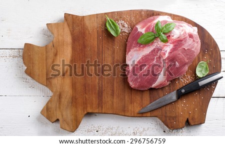 Raw fresh meat on wooden board, selective focus